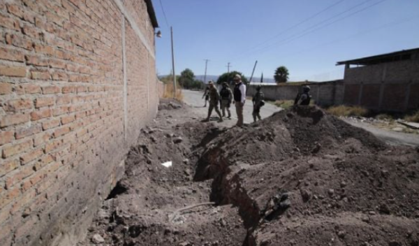 Bodega incendiada en Celaya resultó ser fachada para extraer hidrocarburos